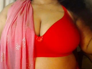 She enjoys youth by showing her sexy boobs and pinching her nipples.